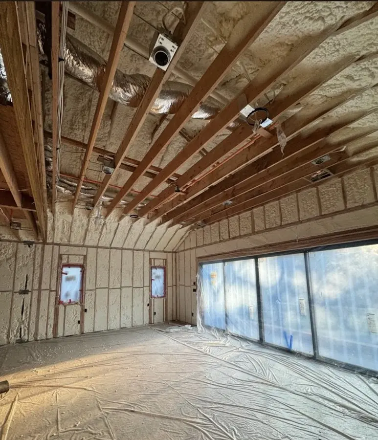Interior walls and ceiling insulated with spray foam during new construction in Woods Creek